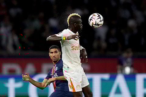 League 1, Paris Saint-Germain vs Montpellier: Falaye Sacko controls the ball above PSG's Achraf Hakimi